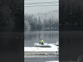 Only in the Adirondacks Shoveling out a Boat Long Lake NY