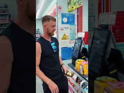 Bezahlung per Hand im Supermarkt