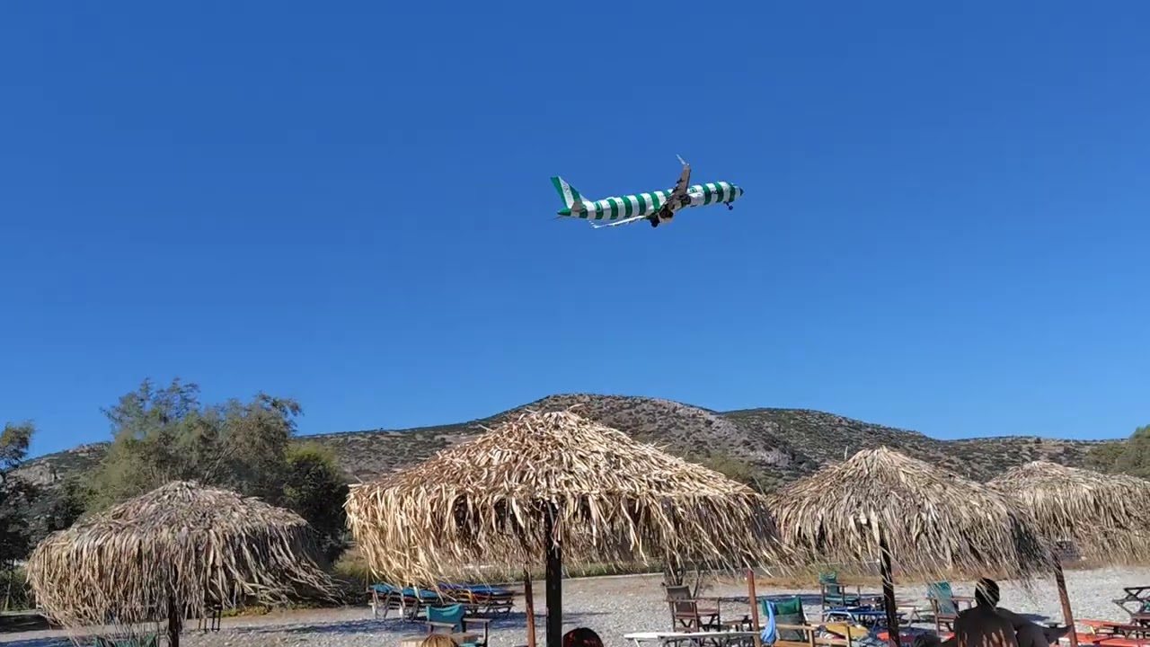 Airplane taking off at Potokaki beach in Samos island