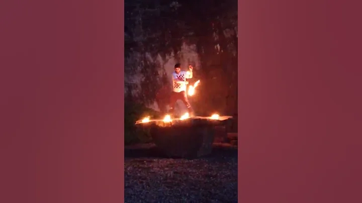 fire performer at drum circle