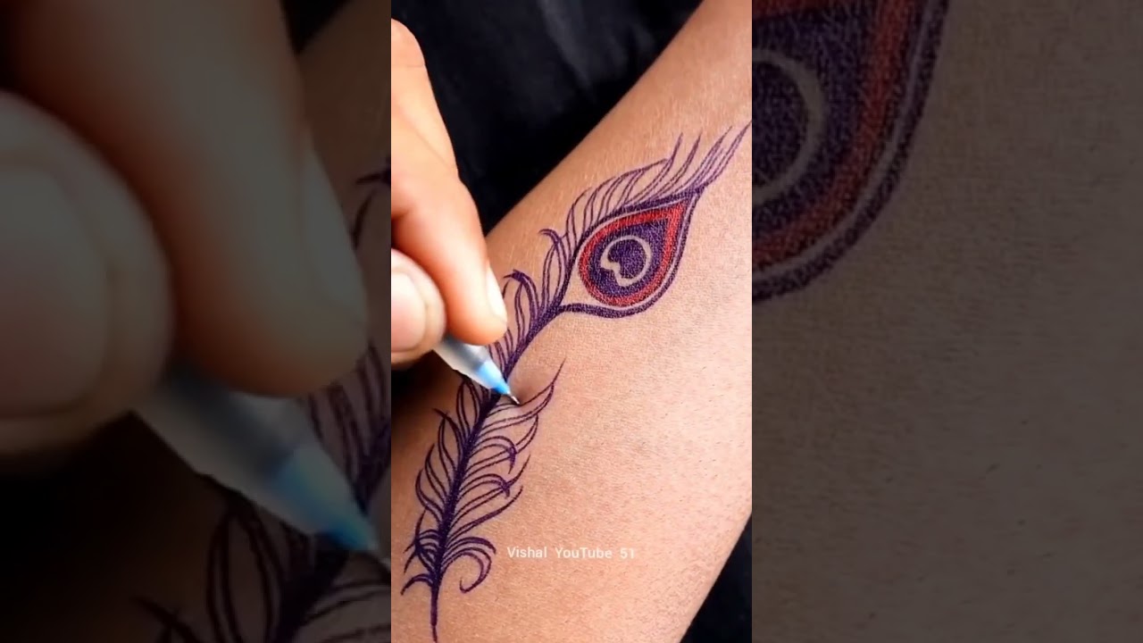 mor pankh hand with pen tattoo so watch 