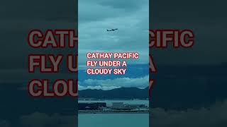 CATHAY PACIFIC FLY UNDER A CLOUDY SKY #trending #shortsfeed #viralvideo #hongkong CATHAY PACIFIC FLY UNDER A CLOUDY SKY #trending #shortsfeed #viralvideo #hongkong