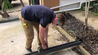 How to install a Colorbond slat fencing panel  Outback fencing