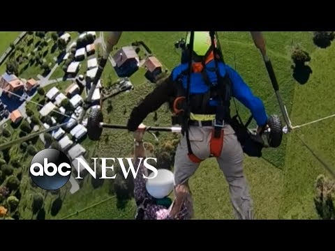 Hang-glider's attempt to save his life caught on camera