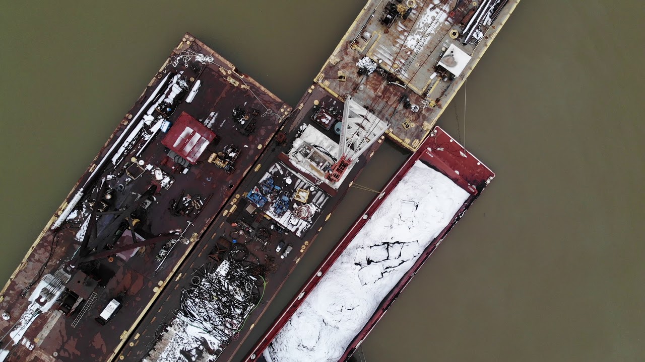 sailboats for sale texas Ohio River Water and Debree with half sunken coal barges to view.