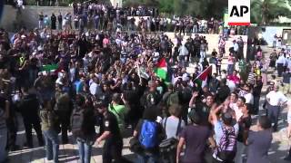 Palestinian protesters scuffle with Israelis during Jerusalem Day march