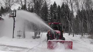 Snow Blowing with a Kubota Grand L 4760.  15 degree fahrenheit  day.  Gas can mod.