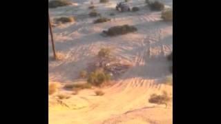 Wayne Dune Riding in the Desert