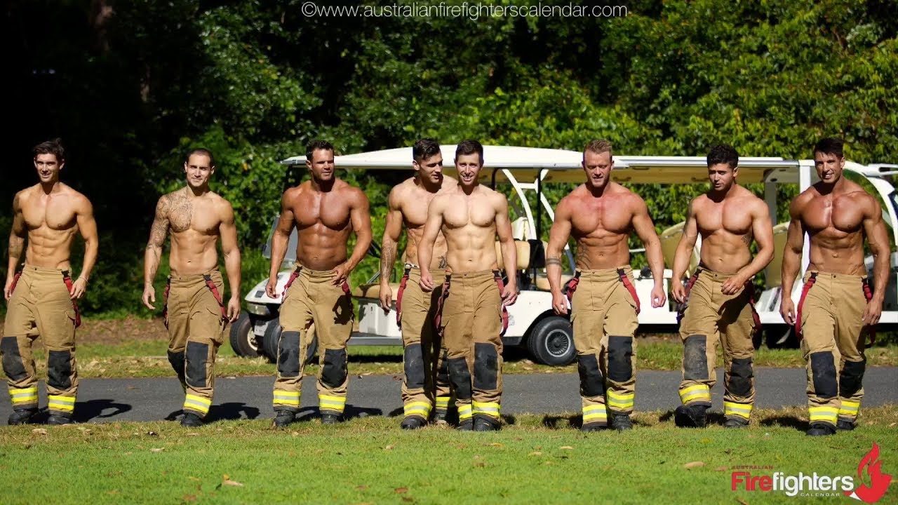 firemen with puppies