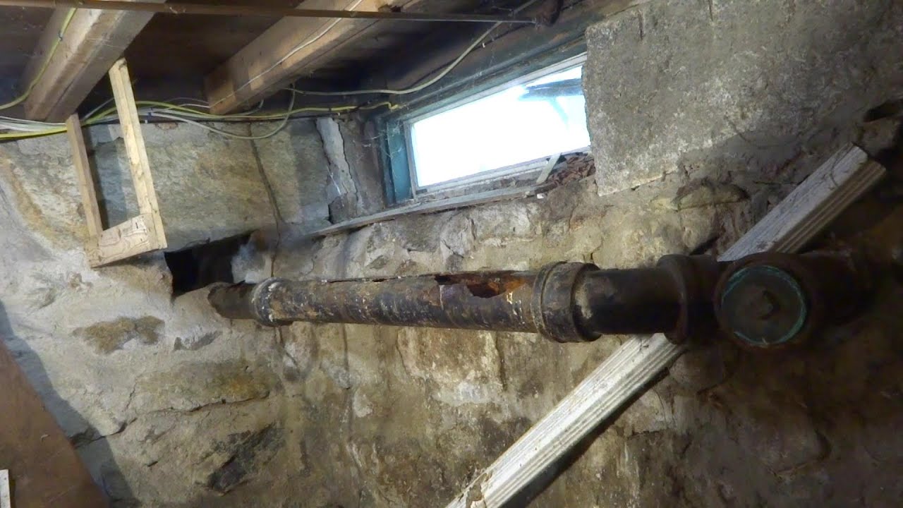 OLD CASTIRON DRAIN LINE ALL ROTTED - CUT OUT AND REPLACE