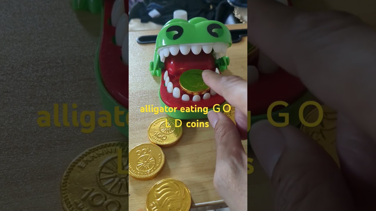 Croco eating gold coins