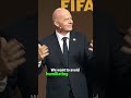 Gianni Infantino walks into the locker room, accompanied by several FIFA officials.