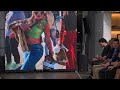 Artwork on the runway with models at Art Basel Miami Exa Shows