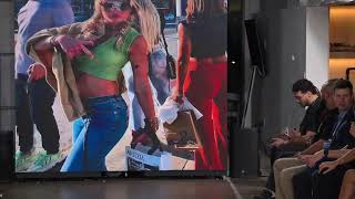Artwork on the runway with models at Art Basel Miami Exa Shows