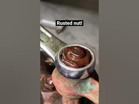 Removing rusted and seized nut and bolt! #restoration #metalworking #