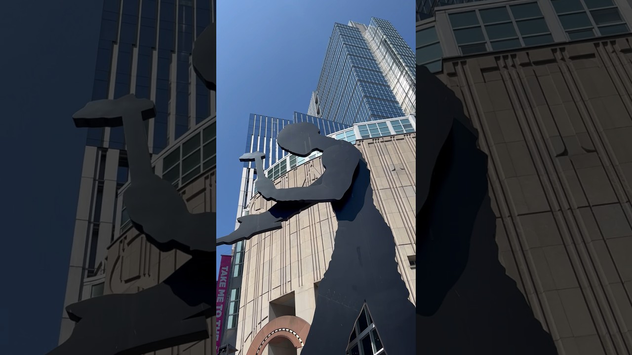 Seattle’s Hammering Man. 48-foot high metal sculpture guards the entrance to the Art Museum.