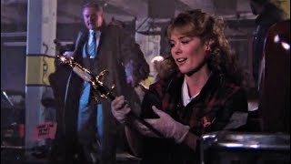 Roxanne Hart in vinyl gloves