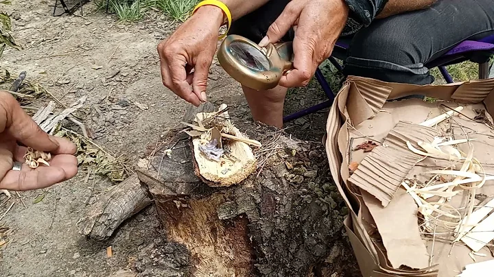 Making a fire with a magnifying glass