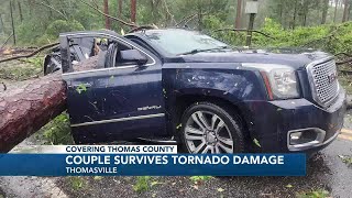 ‘Thank you, Jesus. We are ok’: Tree smashes car during EF-1 tornado, narrowly misses Thomasville...
