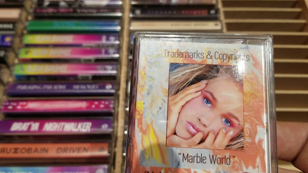 Loading all my Vaporwave cassettes into cassette shelves