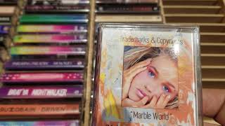 Loading all my Vaporwave cassettes into cassette shelves