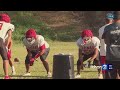 Lahainaluna High School students walk the stage after enduring rough 4 years