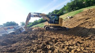 création de talus +plus plate-forme avec la CAT 314E