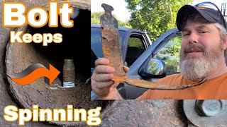 How to remove rusted, spinning bolt from gas tank strap. GMC Sierra, Chevy Trucks, Suburban.