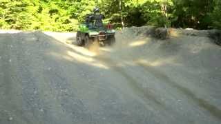 ATV ROLLS DOWN HILL