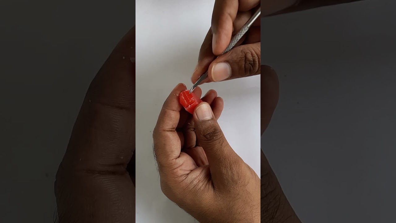 Резьба по первому премоляру верхней челюсти в восковом блоке, автор Камлеш Декате