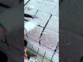 Tidying the center of a new carpet for smooth finishing