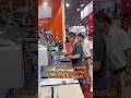 Show the Automatic Laser & Sewing Machine on side for customers 现场演示给客户全自动激光开袋机