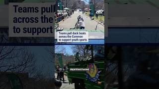 Teams pull duck boats across the Common to support youth sports