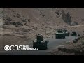 CBS News on front lines with Afghan Army, uprising fighters who are battling Taliban takeover