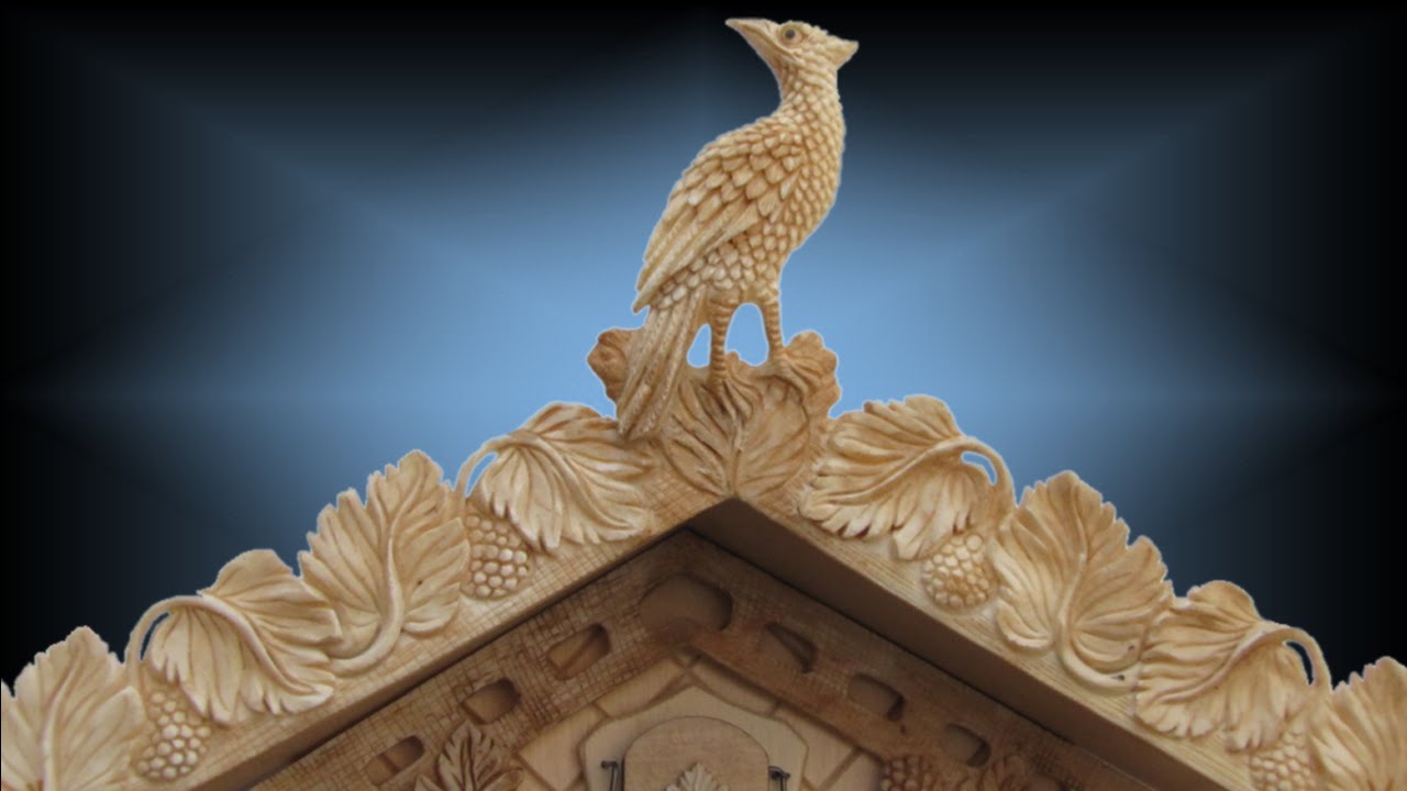 Traditional 8 day Carved Bone 12'' cuckoo clock by Sternreiter