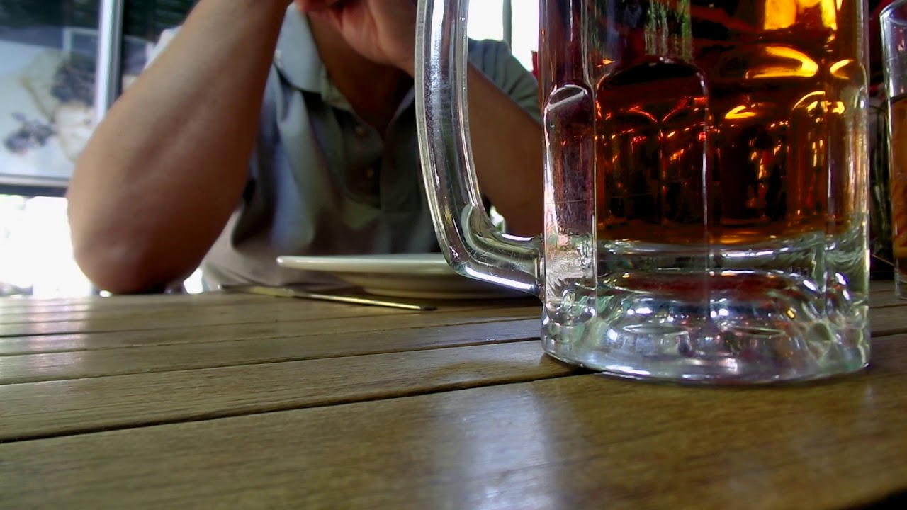 Man with a beer jar in a restaurant 1080p FULL HD FREE STOCK FOOTAGE