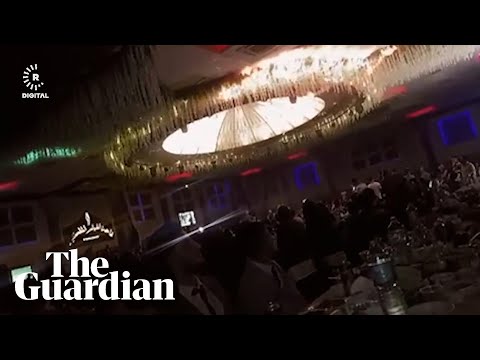 Chandelier catches fire killing over 100 people at a wedding in northern Iraq