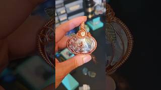 Wire wrapping a pumpkin pendant! #wirewrapping #pumpkinseason #handmadejewelry