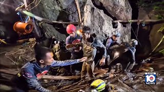 Rescuers evacuate first of 5 villagers found trapped in Laos cave; 2 remain missing