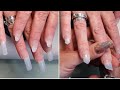 Salon Nails. How to apply nail tips for almond shape.