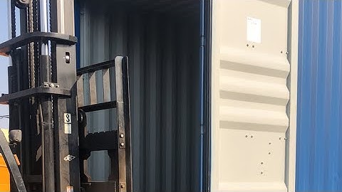 Guinee QT4-15 fully automatic block machine loading containers