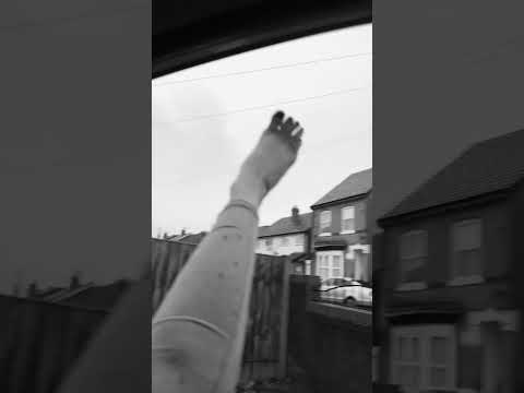Bare feet up on rainy windscreen 👣🌧️