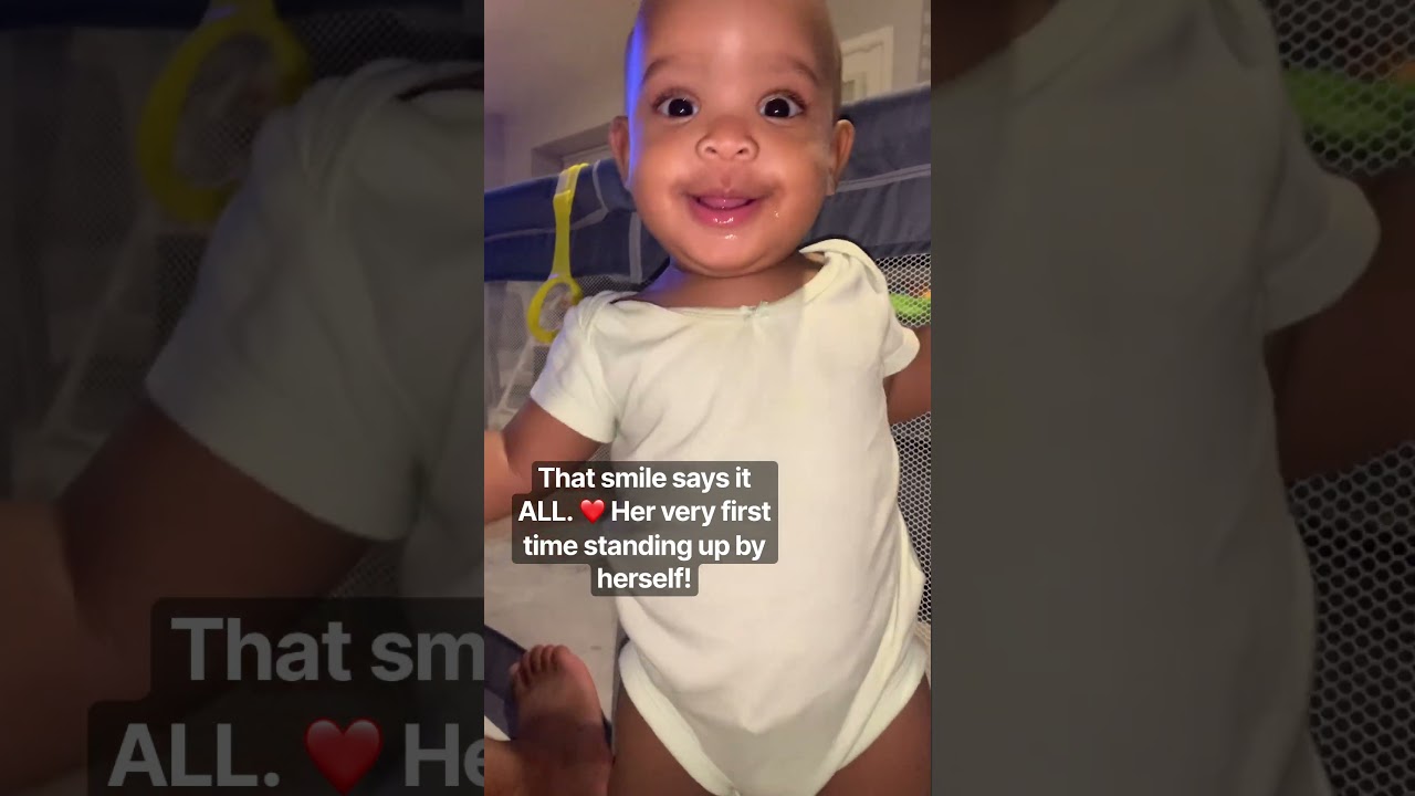 That smile says it ALL. ❤️ Her very first time standing up by
