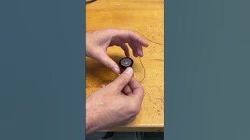Light a bulb with a battery and one wire