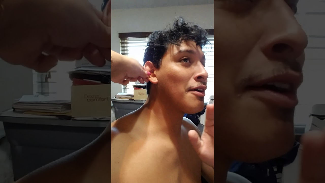Guy Getting His Ears Pierced