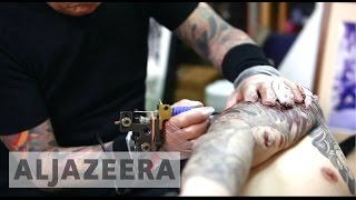 An ancient tattoo art is making a comeback in thailand. sak yant, or
sacred tattoos, are believed to bring protection and good luck. al
jazeera’s florence lo...