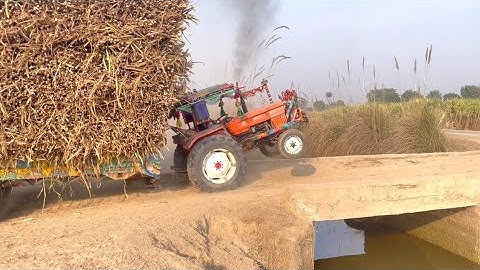 FIAT 480 CROSSING CANAL BRIDGE WITH VERY HEAVY LOADED TROLLEY