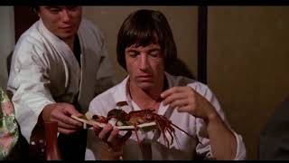 Scott Glenn eating seafood in The Challenge (1982)