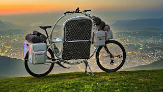 Transforming Bike Folds-Out Into Mini Camper Loaded With Features