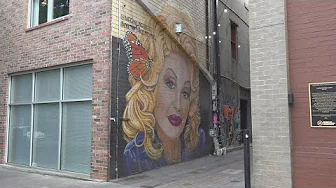 Vandals strike Dolly Parton mural in Strong Alley again, but repairs are swift